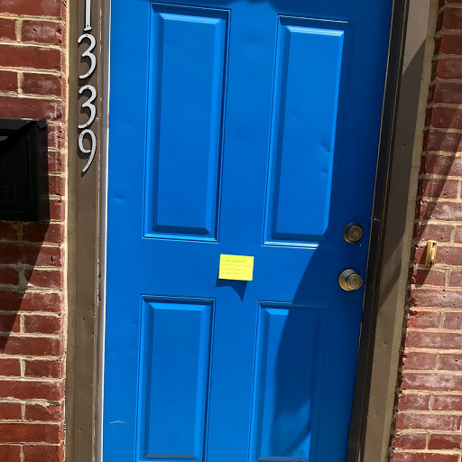 Sticky note posted on door